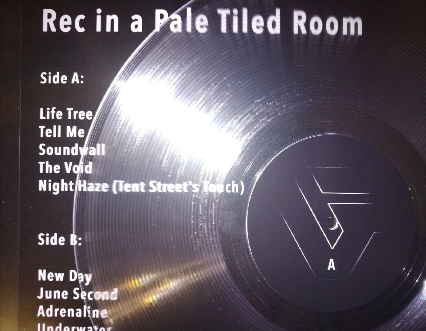 Rec in a Pale Tiled Room